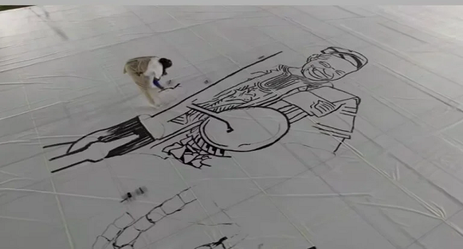 GWR: Supporters gather to cheer artist for largest drawing attempt ...